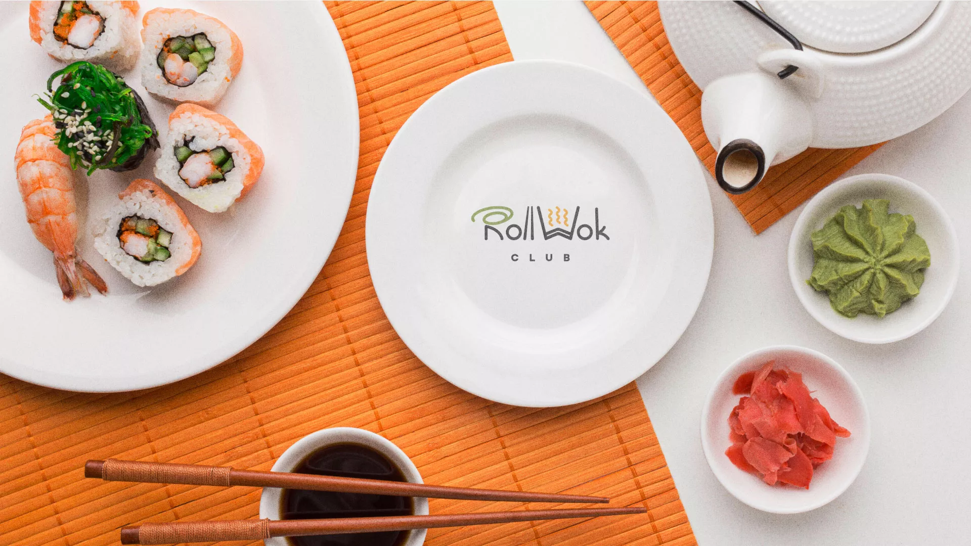 Разработка логотипа и фирменного стиля суши-бара «Roll Wok Club» в Махачкале